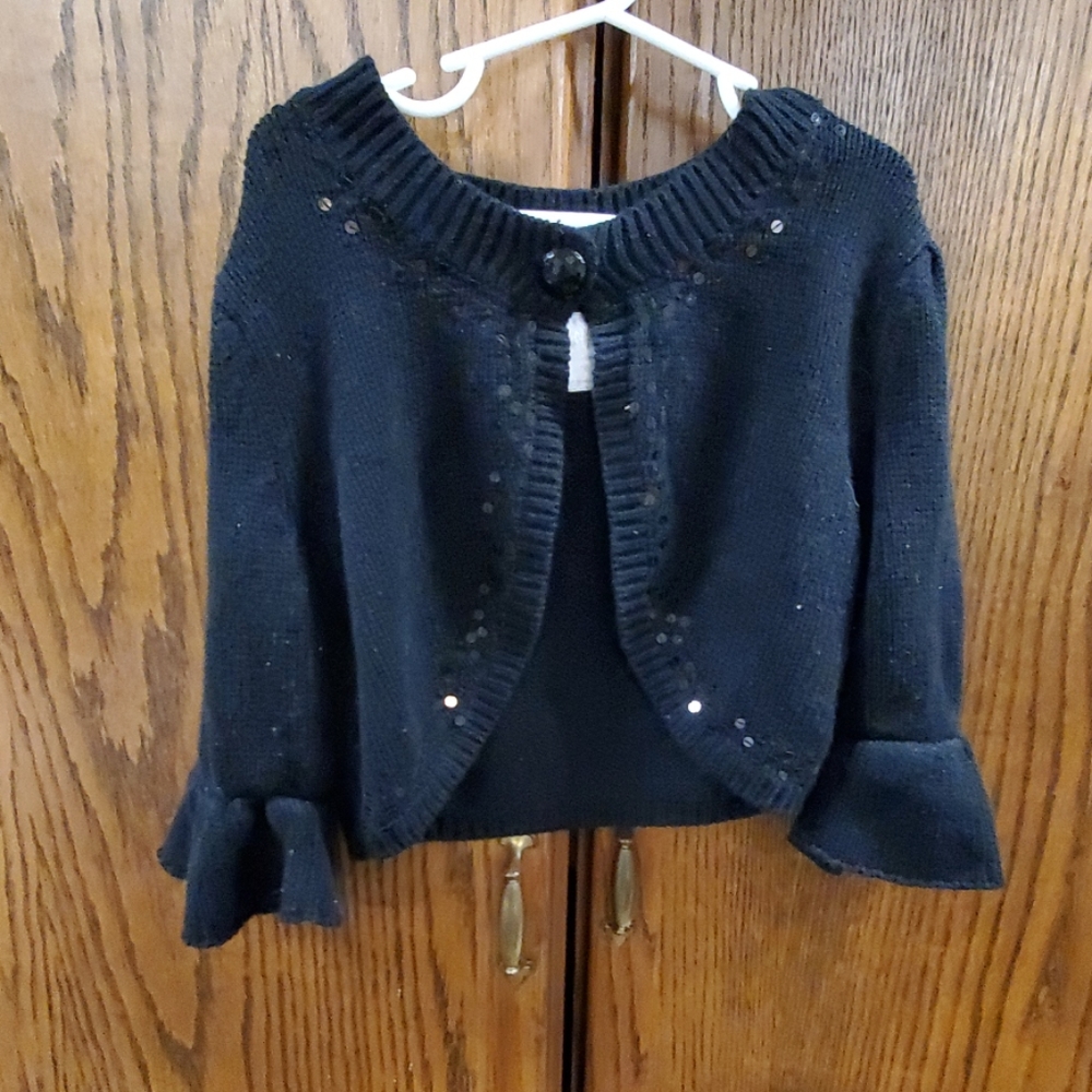Justice sweater